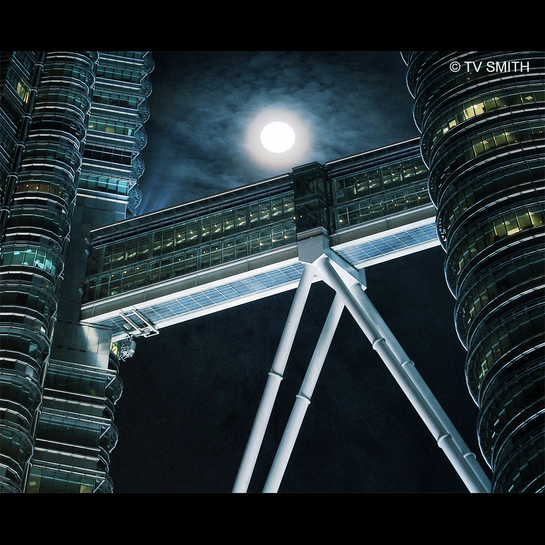 Moonwalk - Skybridge of the Petronas Twin Towers at night Moonwalk - Skybridge of the Petronas Twin Towers at night